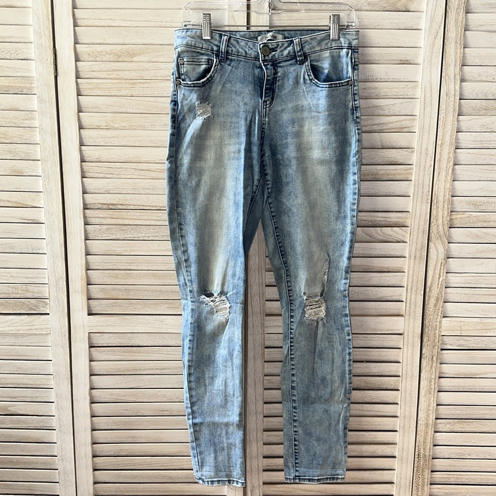 Blue acid wash like jeans.